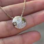Scattered lab grown diamond disc pendant on yellow gold chain video
