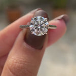 Round brilliant diamond solitaire engagement ring video
