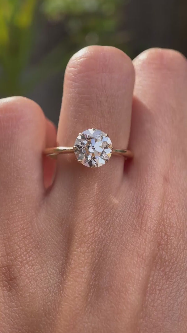 8 prong vintage style OEC engagement ring on hand video