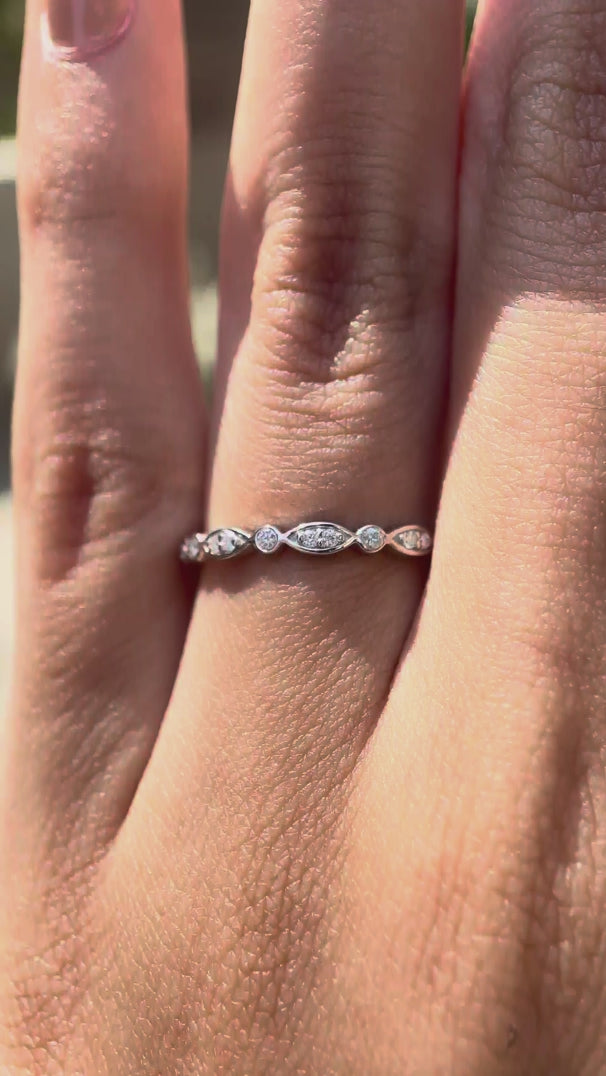 Video showing the Art Deco moissanite wedding band from multiple angles, highlighting the geometric design.