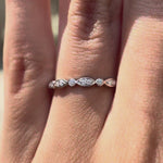 Video showing the Art Deco moissanite wedding band from multiple angles, highlighting the geometric design.