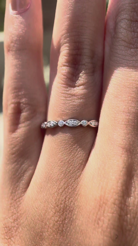 Video showing the Art Deco moissanite wedding band from multiple angles, highlighting the geometric design.