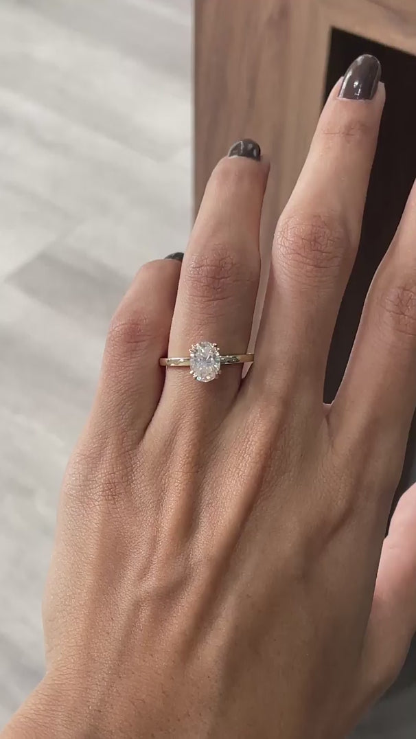 Minimal oval moissanite engagement style ring
