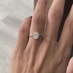 Minimal oval moissanite engagement style ring