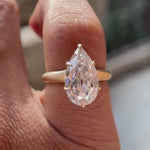 Rotating view of Old Mine Cut Pear Moissanite Ring in Yellow Gold