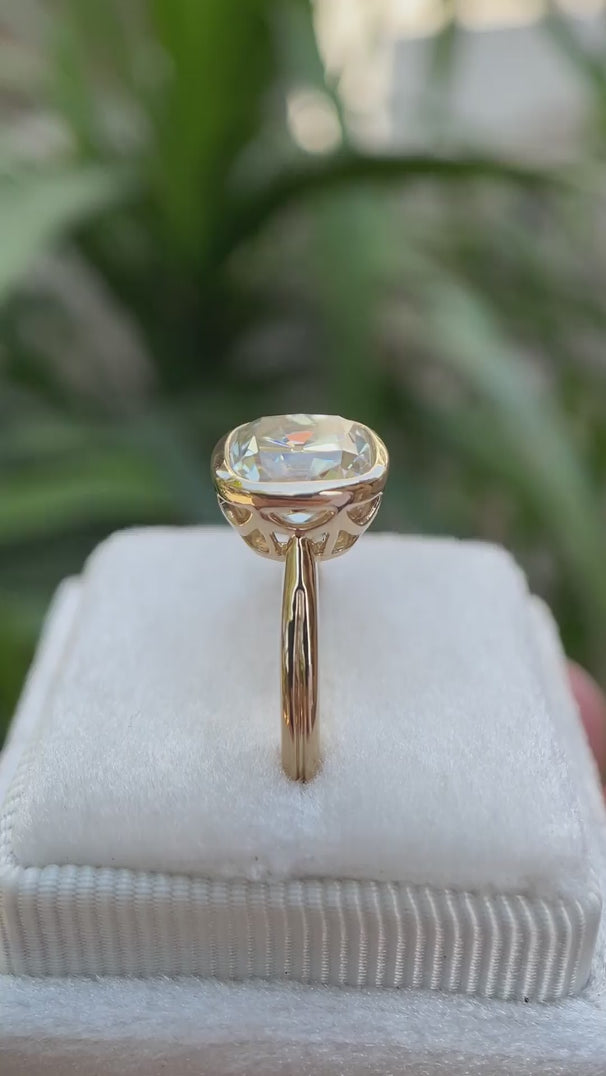 Bezel set cushion moissanite solitaire ring in white box rotating video