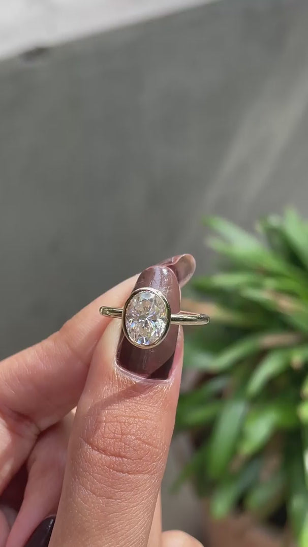 Floating style oval lab diamond engagement ring top view video