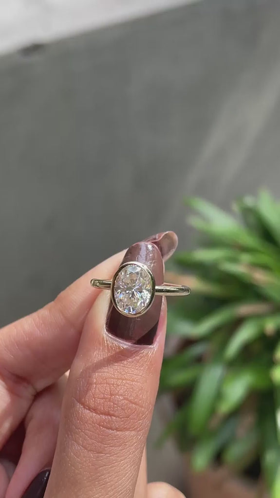 Floating style oval lab diamond engagement ring top view video