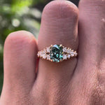 Oval blue green moissanite cluster ring rotating view