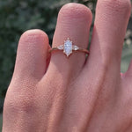 Marquise cut center stone with pear side stones yellow gold ring video