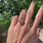 Pear champagne moissanite cathedral engagement ring with pave band video