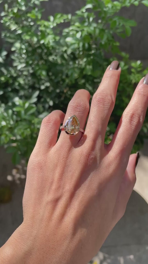Pear champagne moissanite cathedral engagement ring with pave band video