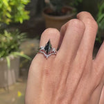 Gothic engagement ring set featuring kite cut black moissanite solitaire ring with platinum chevron wedding band