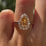 Pear cut brownish champagne moissanite halo engagement ring on hand video