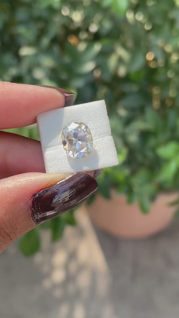 Old mine cut elongated cushion off white moissanite video