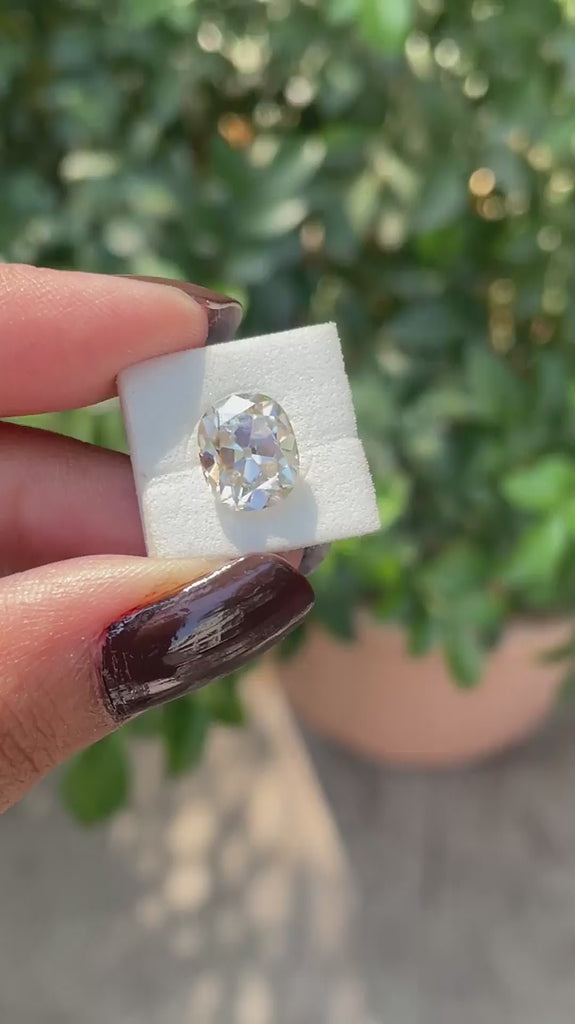 Old mine cut elongated cushion off white moissanite video
