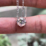 2 CT round solitaire moissanite pendant front view video