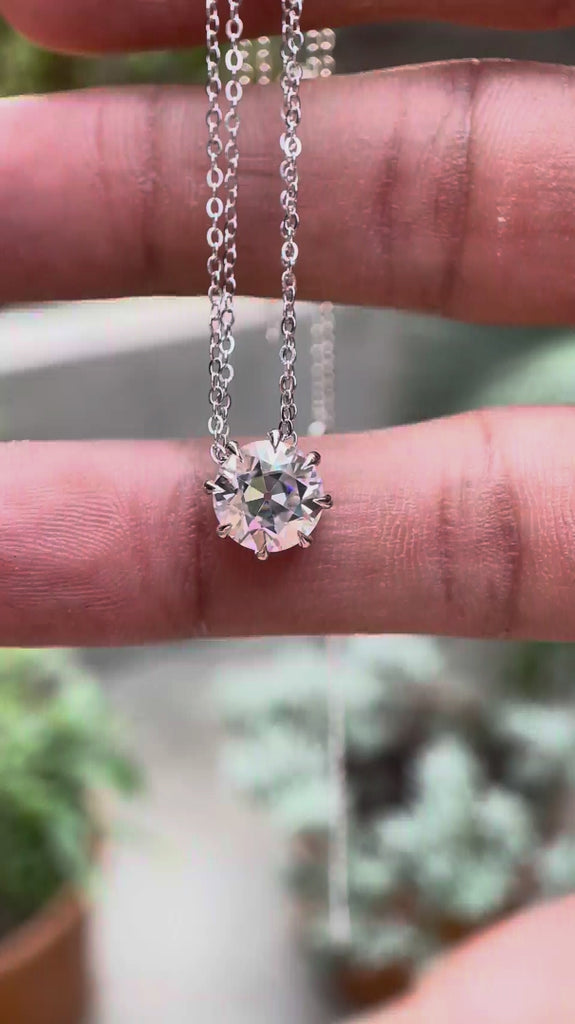 2 CT round solitaire moissanite pendant front view video