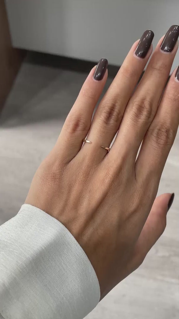 Minimalist solid gold open cuff claw wedding band rotating view showing sleek profile