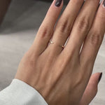 Minimalist solid gold open cuff claw wedding band rotating view showing sleek profile