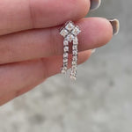 Round and pear cut lab diamond hanging statement earrings in white gold