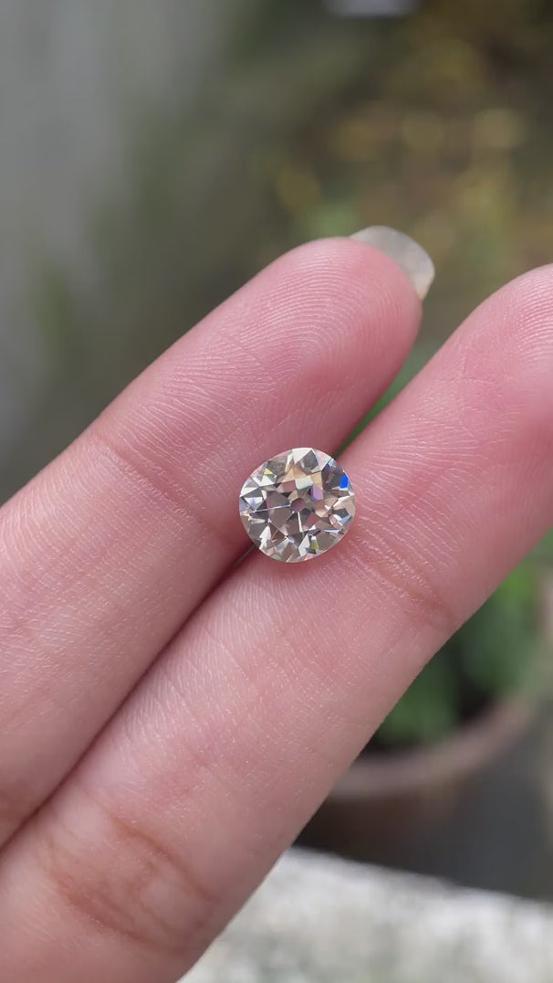 Old mine cut elongated cushion moissanite stone video