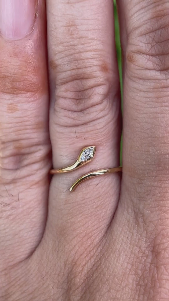 Product video showcasing the open marquise diamond snake ring in 14K yellow gold from multiple angles.