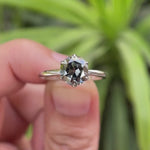 Showcasing the classic ring with prong setting, elegant sparkle from multiple angles