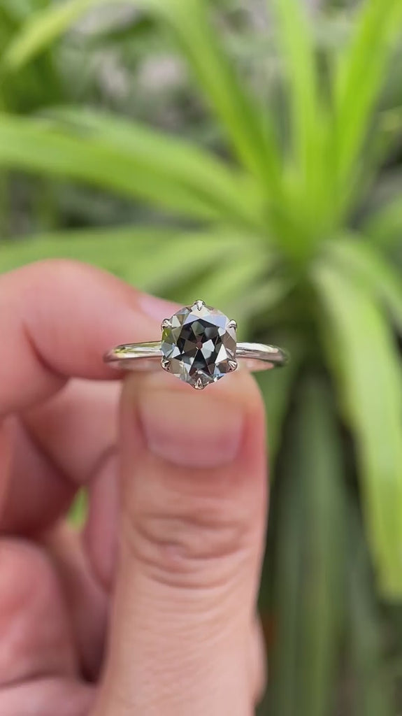 Showcasing the classic ring with prong setting, elegant sparkle from multiple angles