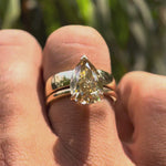 Rotating video of pear solitaire ring with hidden halo