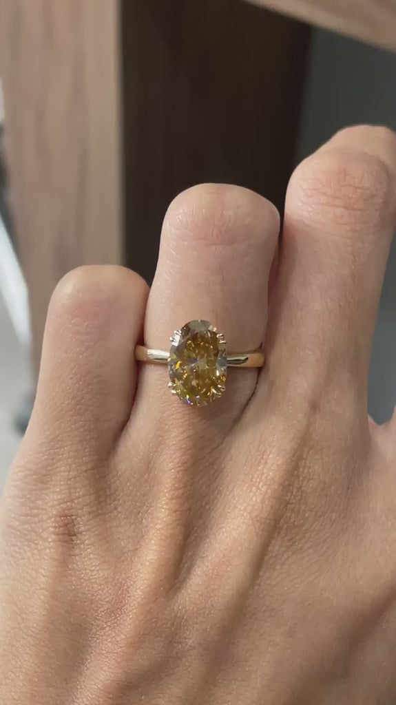 Luxury oval cut moissanite ring polished yellow gold video
