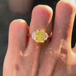 Radiant cut yellow lab diamond three stone engagement ring rotating video view