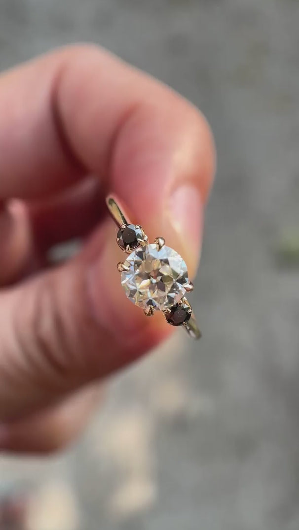 OEC round moissanite ring with black side stones video