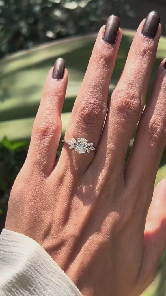 Oval lab diamond engagement ring with floral motif video