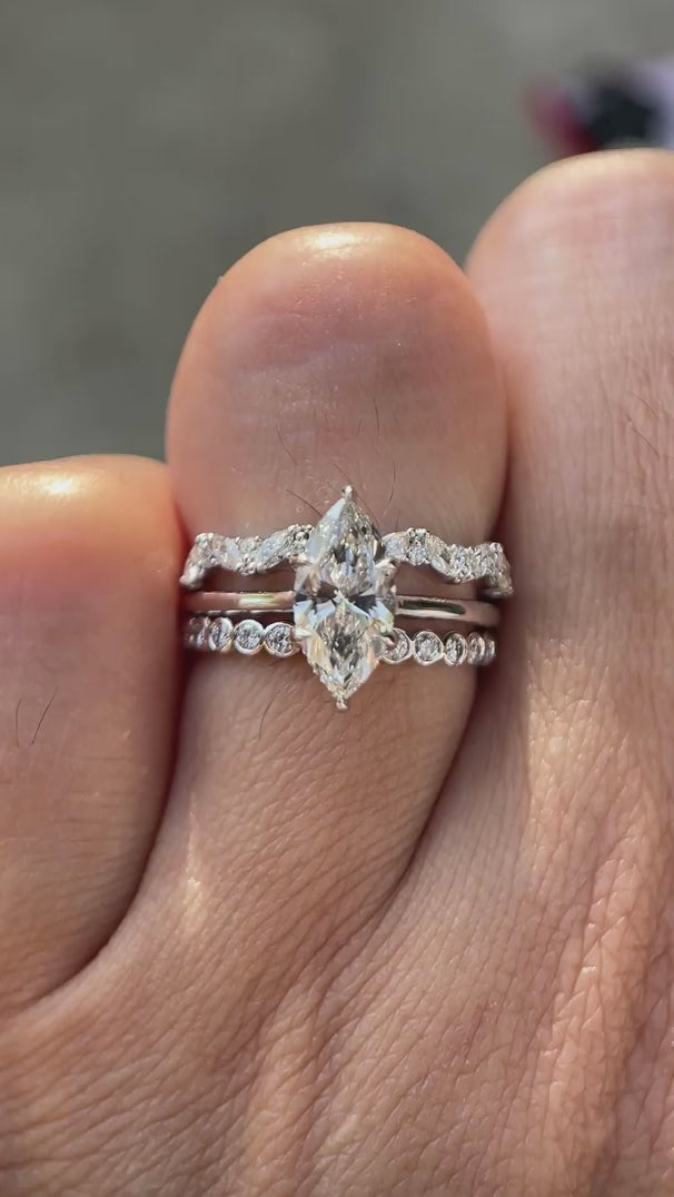 Video showcasing marquise lab grown diamond bridal ring set in 14K white gold from multiple angles