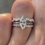 Video showcasing marquise lab grown diamond bridal ring set in 14K white gold from multiple angles