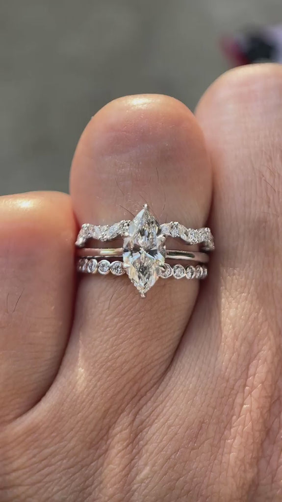 Video showcasing marquise lab grown diamond bridal ring set in 14K white gold from multiple angles