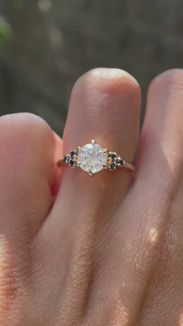 Video rotating cluster ring, showing OEC sparkle and black accents.