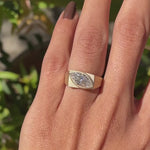 Marquise moissanite signet ring in 10k yellow gold shown in rotating video