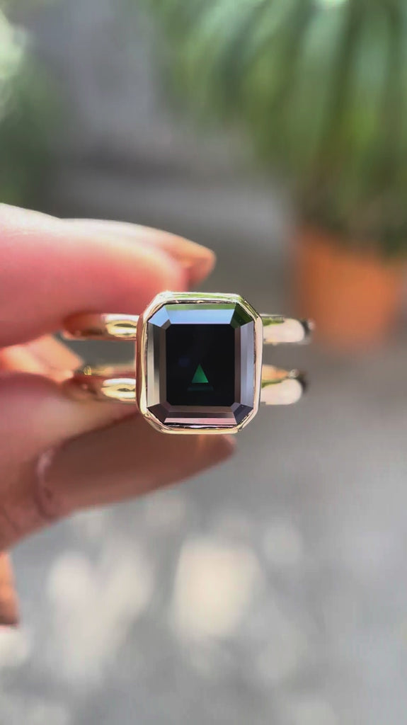 Moissanite Solitaire Elongated Asscher Ring showcasing its unique black green stone with high polish finish