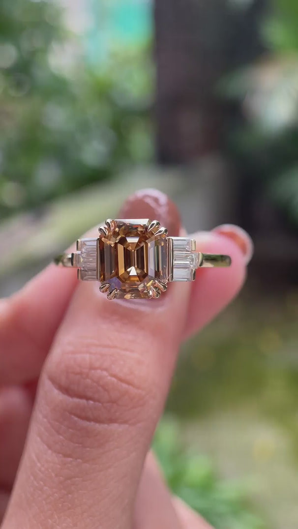 Dark champagne and baguette cluster engagement ring video