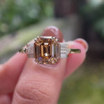 Dark champagne and baguette cluster engagement ring video