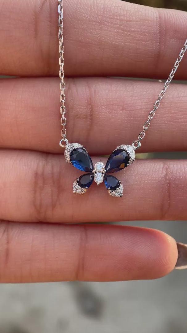 Nature inspired butterfly pendant necklace with lab diamonds and blue sapphires video