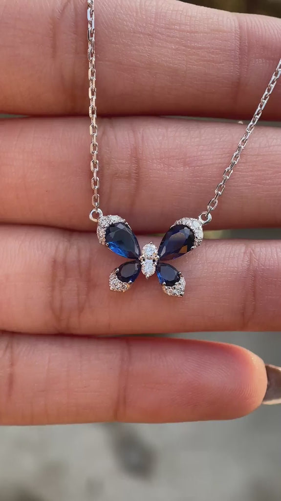Nature inspired butterfly pendant necklace with lab diamonds and blue sapphires video