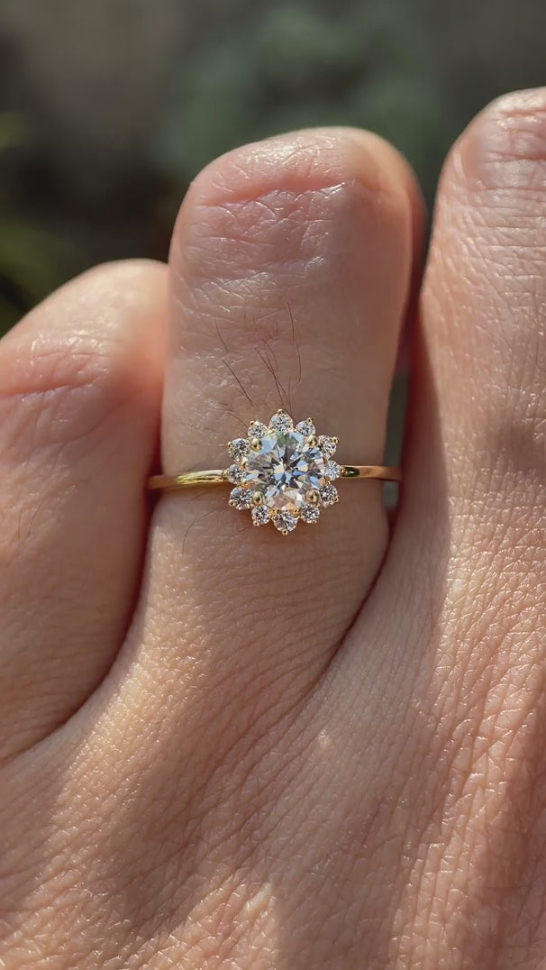 Round lab grown diamond halo engagement ring in 14K yellow gold