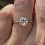 Round lab grown diamond halo engagement ring in 14K yellow gold