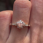 Video showcasing heart shape fancy vivid pink lab grown diamond halo engagement ring in 14K yellow gold