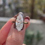 18K white and rose gold marquise solitaire ring on hand video