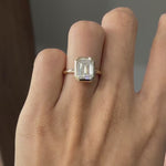 Emerald cut bezel halo engagement ring 18k yellow gold hand video