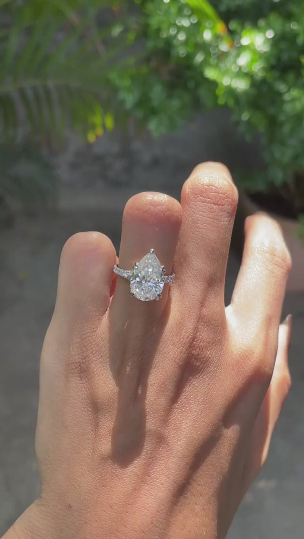 4.25 CT pear cut moissanite cathedral engagement ring in 10k white gold